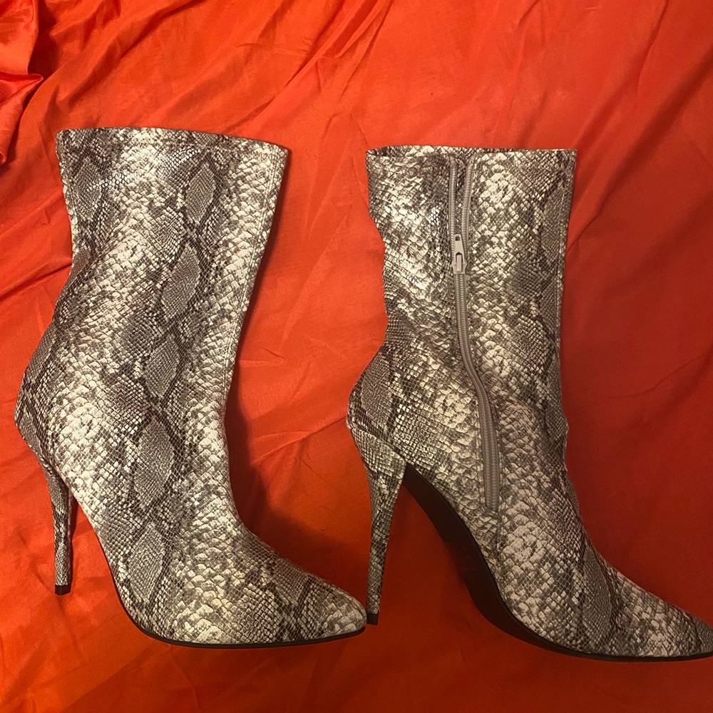 Snake skin boot heels ankle